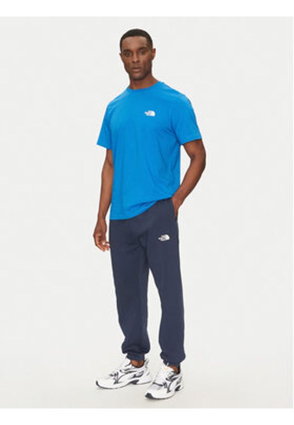 The North Face Spodnie dresowe Simple Dome Light NF0A8C41 Granatowy Regular Fit. Kolor: niebieski. Materiał: syntetyk, bawełna