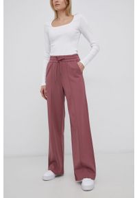only - Only Spodnie damskie kolor różowy proste high waist. Okazja: na co dzień. Stan: podwyższony. Kolor: różowy. Materiał: materiał, tkanina, wiskoza. Styl: casual