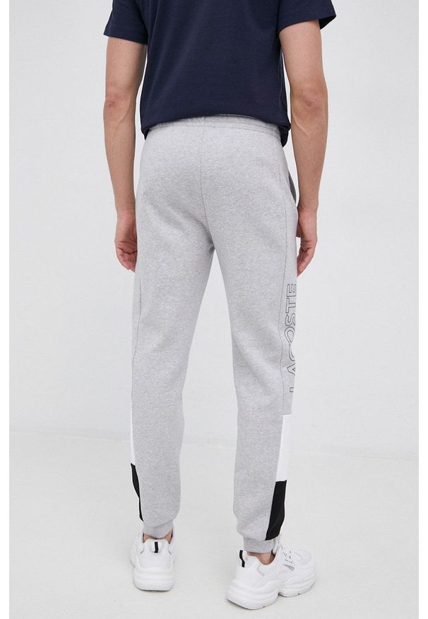 Lacoste - Spodnie. Kolor: szary. Materiał: dzianina