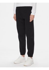 GAP - Gap Spodnie dresowe 729736-00 Czarny Regular Fit. Kolor: czarny. Materiał: bawełna #1