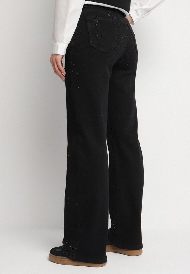 Born2be - Czarne Jeansy z Bawełną o Szerokim Kroju z Wysokim Stanem Dralseli. Okazja: na co dzień. Stan: podwyższony. Kolor: czarny. Styl: elegancki, casual