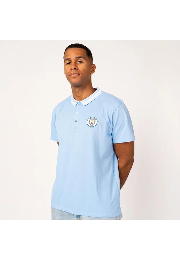 MANCHESTER CITY - Polo męskie Manchester City. Typ kołnierza: polo. Kolor: niebieski. Wzór: aplikacja. Sport: piłka nożna
