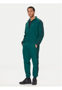 Adidas - adidas Bluza adicolor Woven Firebird JY1329 Zielony Loose Fit. Kolor: zielony. Materiał: syntetyk #5