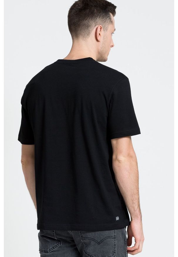 Lacoste - T-shirt. Okazja: na co dzień. Kolor: czarny. Materiał: dzianina. Wzór: gładki. Styl: casual