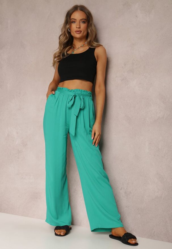 Renee - Miętowe Spodnie Szerokie Phiorephis. Kolor: miętowy. Materiał: wiskoza, tkanina, materiał. Długość: długie. Wzór: kwiaty, gładki