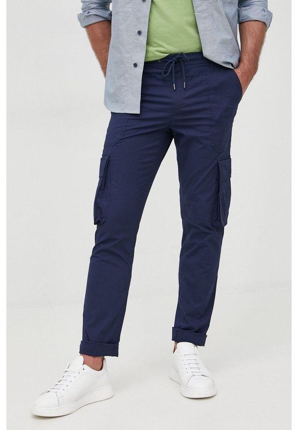 Michael Kors spodnie CS2300X5CW męskie kolor granatowy proste. Okazja: na co dzień. Kolor: niebieski. Materiał: tkanina. Styl: casual