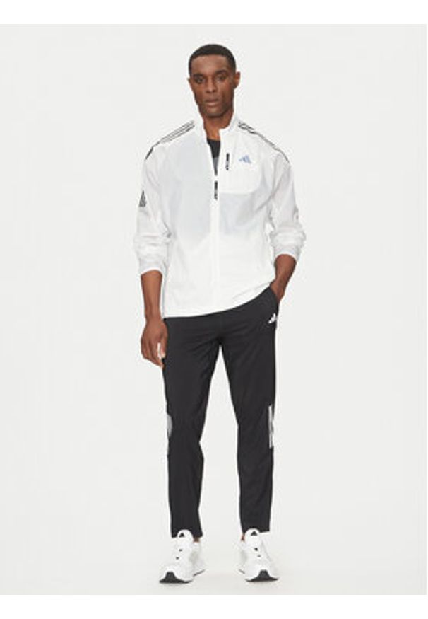Adidas - adidas Kurtka do biegania Own the Run 3-Stripes JD7760 Biały Slim Fit. Kolor: biały. Materiał: syntetyk. Sport: bieganie