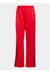 Adidas - adidas Spodnie dresowe adicolor Classics SST IM9809 Czerwony Loose Fit. Kolor: czerwony. Materiał: bawełna #2