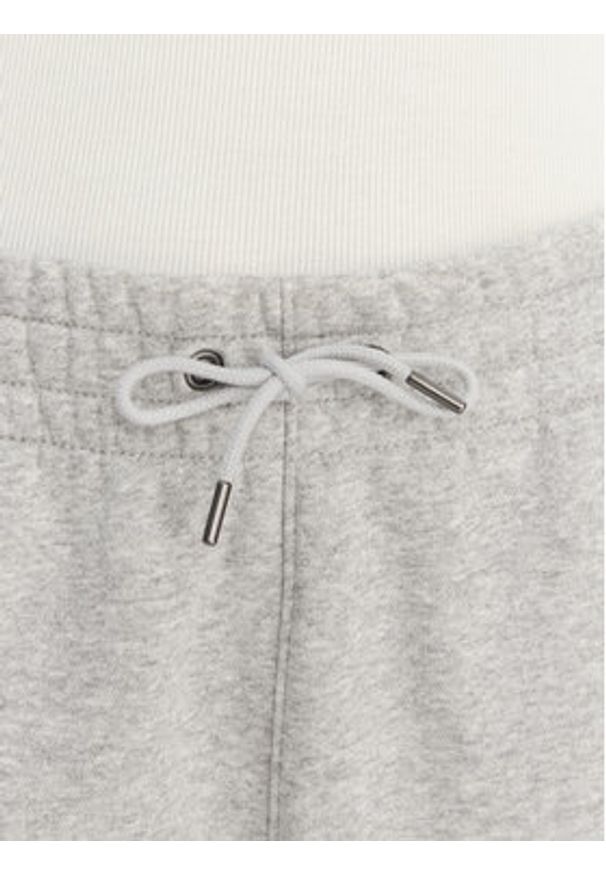 Under Armour Spodnie dresowe UA Icon Fleece 6001537 Szary Slim Fit. Kolor: szary. Materiał: bawełna