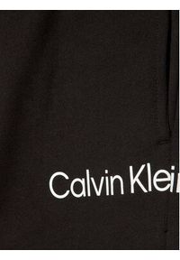 Calvin Klein Jeans Spodnie dresowe Disrupted Inst. Logo IU0IU00323 Czarny Regular Fit. Kolor: czarny. Materiał: bawełna