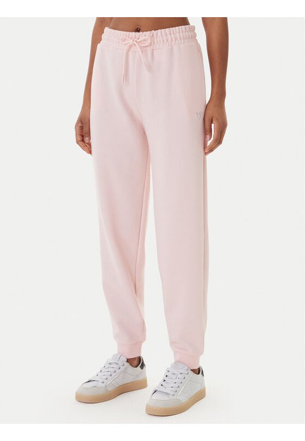 Guess Spodnie dresowe V6GB11 K3095 Różowy Regular Fit. Kolor: różowy. Materiał: syntetyk, bawełna