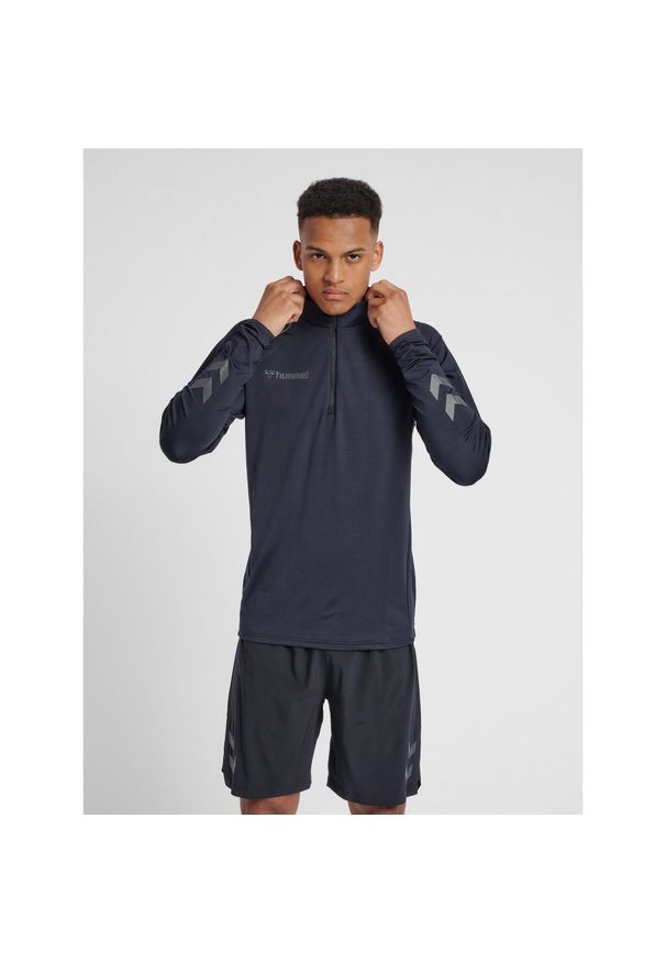 Bluza Hummel Half Zip hmlAUTHENTIC Pro. Kolor: brązowy, czarny, szary, wielokolorowy. Sezon: jesień, zima. Sport: fitness