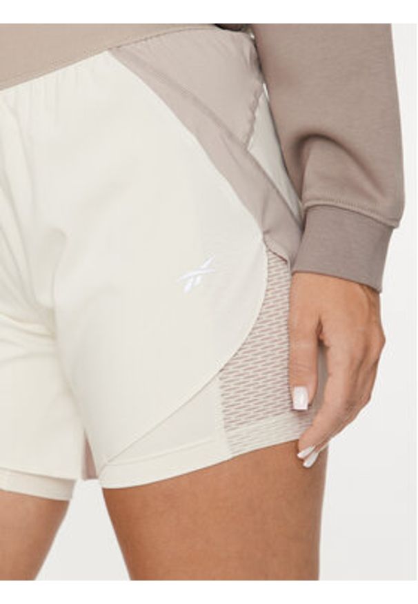 Reebok Szorty sportowe Running 2 in 1 Short 100076065 Beżowy Slim Fit. Kolor: beżowy. Materiał: syntetyk. Sport: bieganie