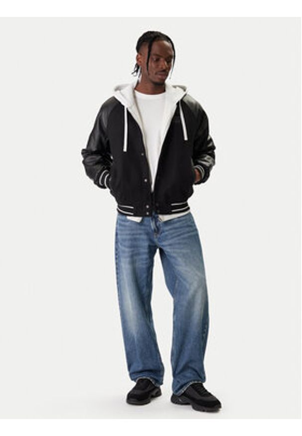 Tommy Jeans Kurtka bomber DM0DM22439 Czarny Regular Fit. Kolor: czarny. Materiał: syntetyk