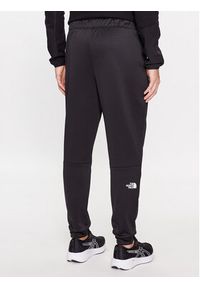 The North Face Spodnie dresowe Reaxion NF0A7Z9P Czarny Regular Fit. Kolor: czarny. Materiał: syntetyk #5
