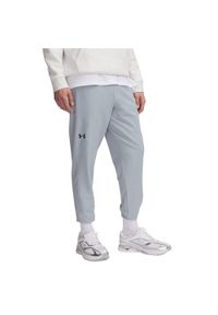Spodnie treningowe męskie Under Armour Unstoppable Tapered. Kolor: niebieski. Sport: fitness #1
