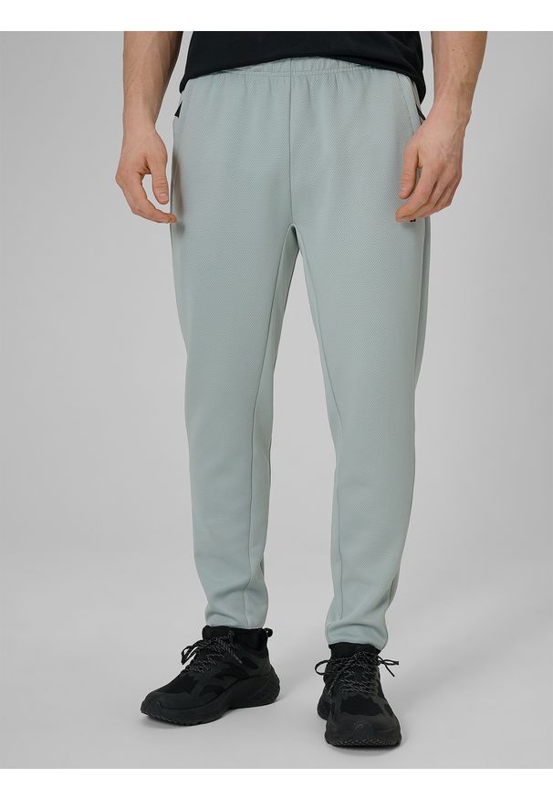 4f - 4F Spodnie treningowe szybkoschnące męskie - miętowe M. Kolor: turkusowy. Materiał: materiał. Sport: fitness
