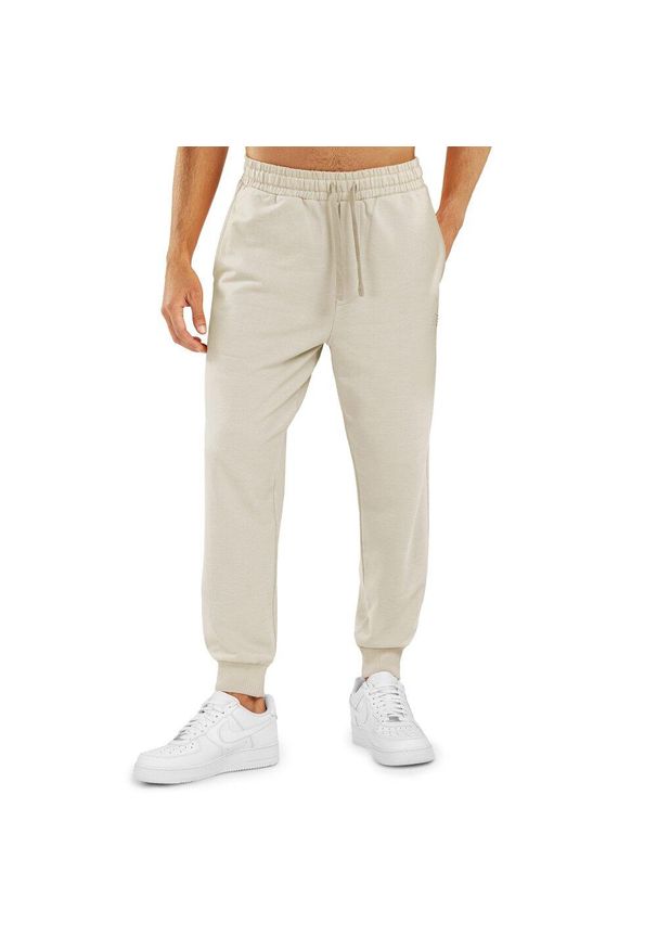 Spodnie dresowe Lifestyle męskie SIROKO Sand. Kolor: beżowy. Materiał: dresówka. Sport: fitness