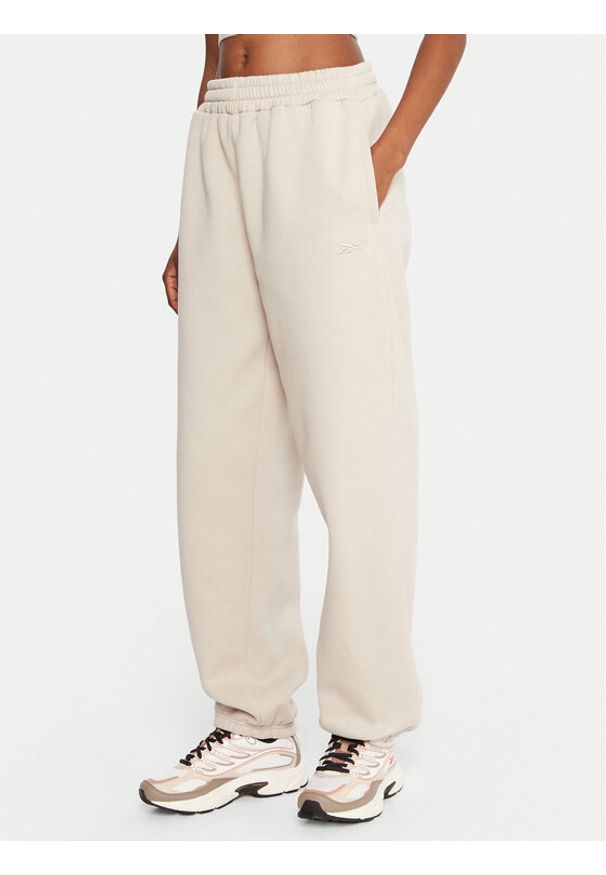 Reebok Spodnie dresowe Reebok X Ewa Chodakowska RK25304CCW Beżowy Regular Fit. Kolor: beżowy. Materiał: syntetyk, bawełna