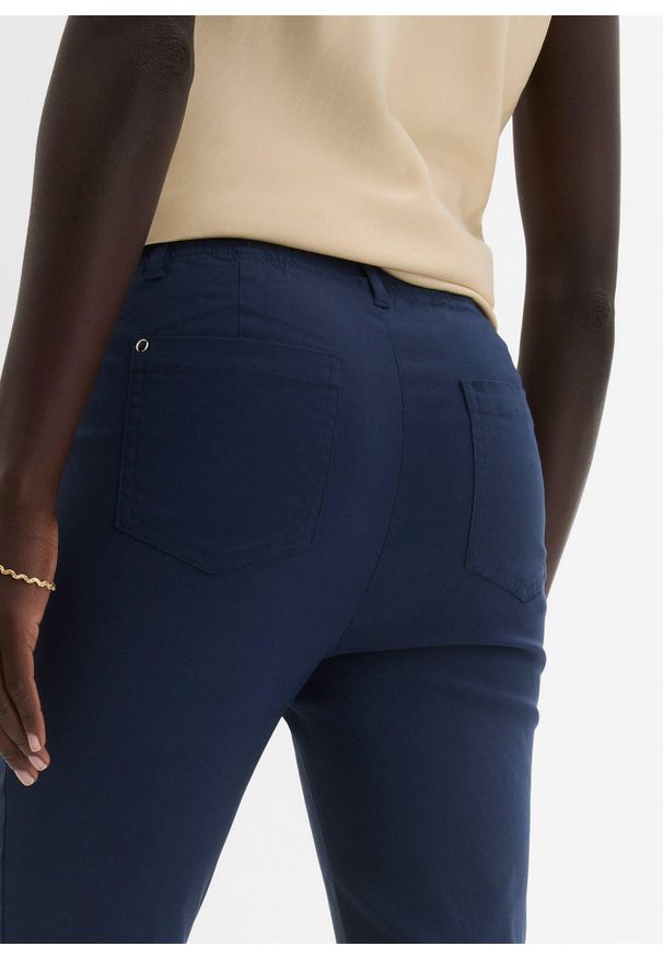 bonprix - Spodnie ze stretchem z gumką w talii. Kolor: niebieski. Styl: klasyczny