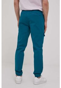 adidas Originals spodnie HF4800 męskie kolor zielony joggery. Kolor: zielony. Materiał: tkanina, materiał #2
