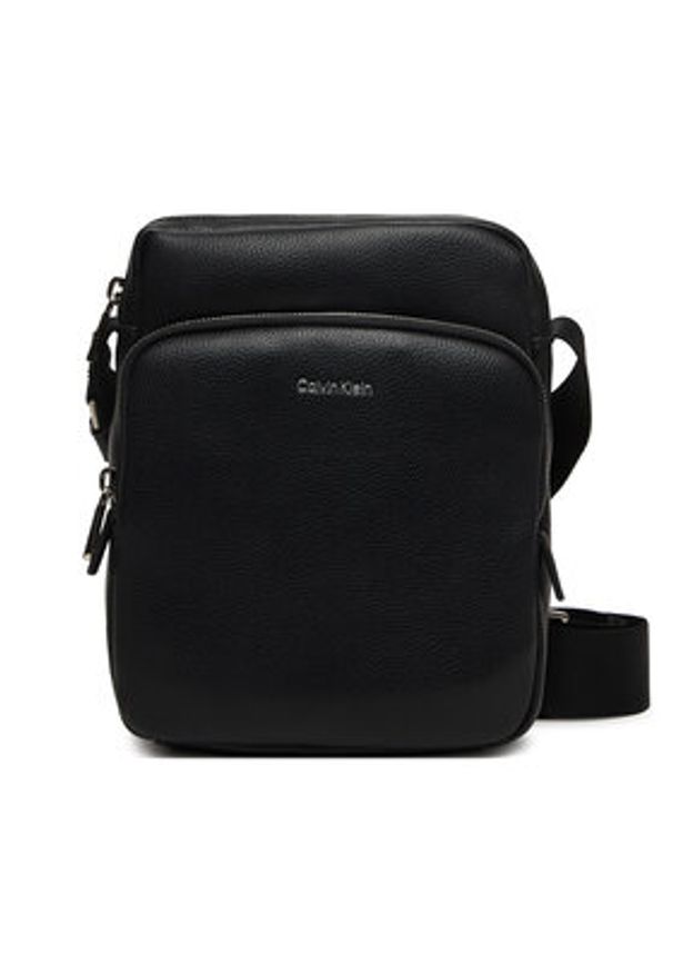 Calvin Klein Saszetka Raised Pocket Reporter LV04D3317G Czarny. Kolor: czarny. Materiał: skóra