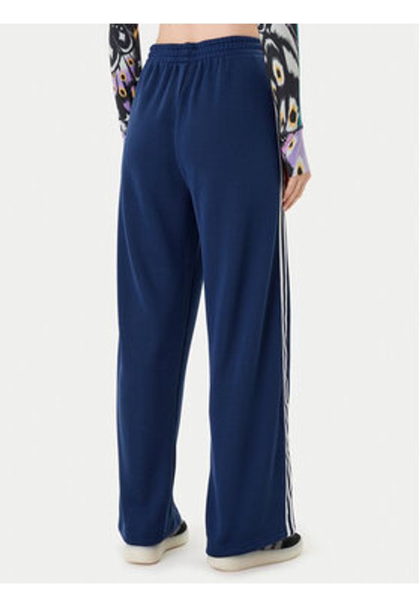 Adidas - adidas Spodnie dresowe adicolor Firebird JV7524 Granatowy Regular Fit. Kolor: niebieski. Materiał: syntetyk