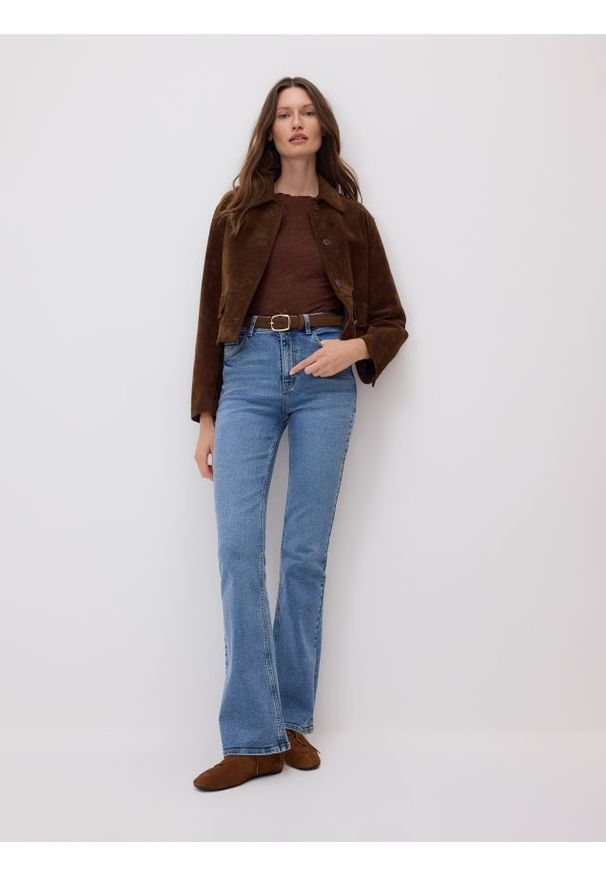 Reserved - Jeansy flare bootcut - niebieski. Kolor: niebieski