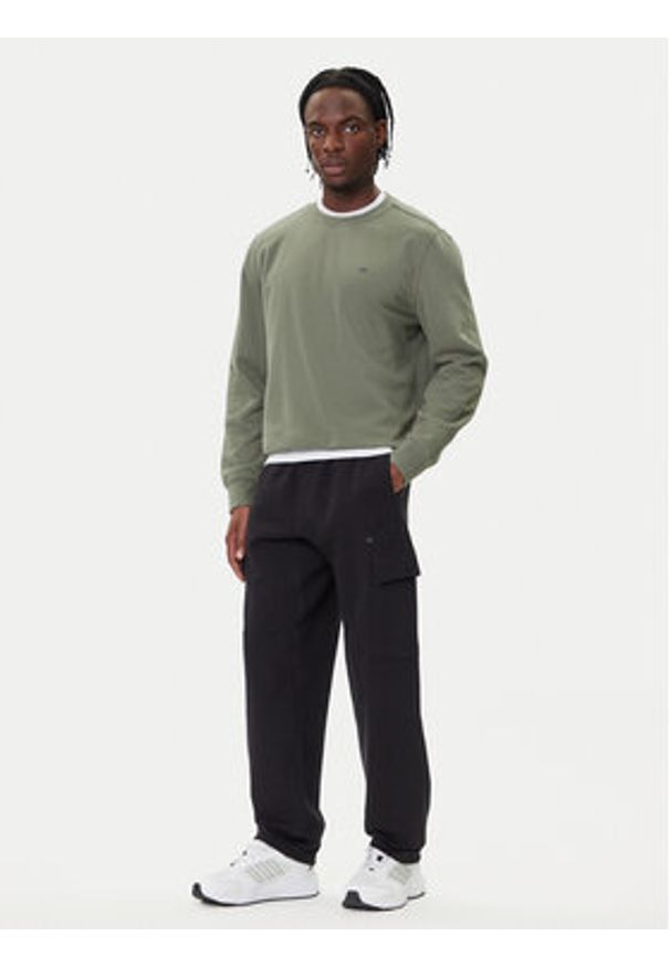 Adidas - adidas Spodnie dresowe ALL SZN French Terry JN0580 Czarny Loose Fit. Kolor: czarny. Materiał: bawełna