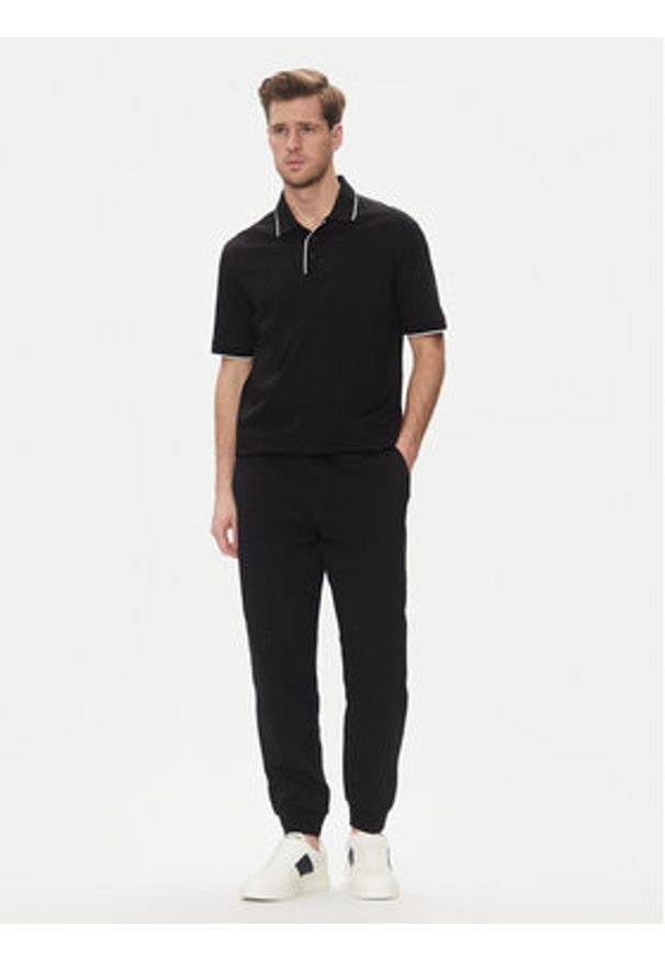 Armani Exchange Spodnie dresowe XM000744 AF13047 UC001 Czarny Regular Fit. Kolor: czarny. Materiał: bawełna