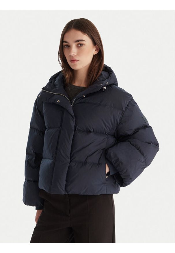 Calvin Klein Kurtka puchowa LV044D525G Granatowy Relaxed Fit. Kolor: niebieski. Materiał: syntetyk