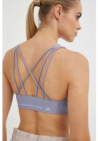 adidas Performance biustonosz do jogi kolor fioletowy gładki. Kolor: fioletowy. Materiał: skóra, materiał. Wzór: gładki. Sport: joga i pilates #4