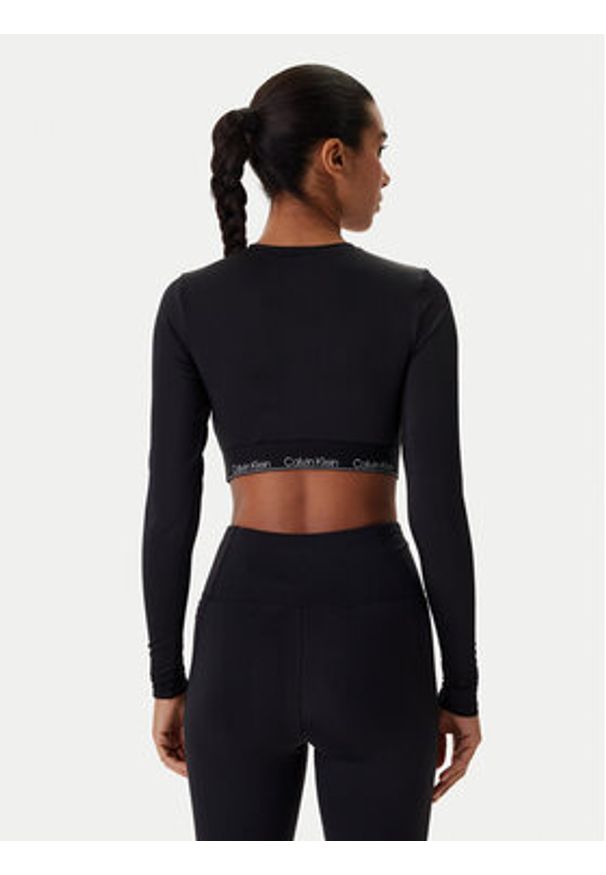 Calvin Klein Swimwear Bluzka LV00Q61128 Czarny Slim Fit. Kolor: czarny. Materiał: syntetyk
