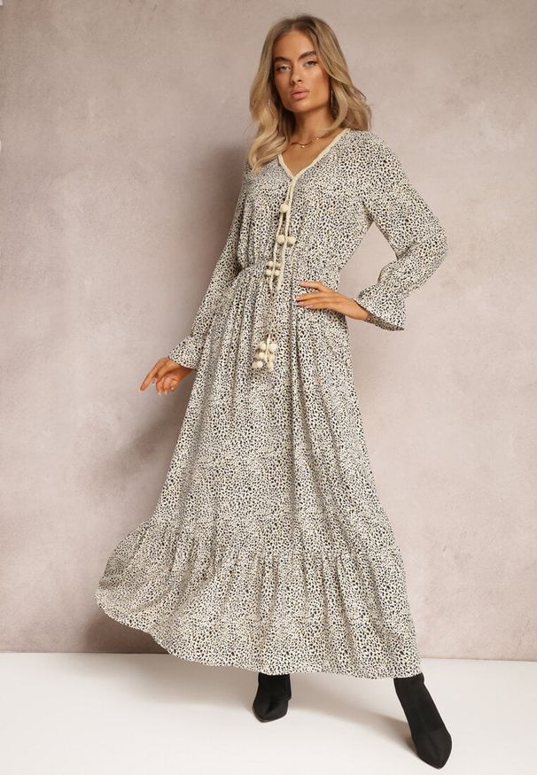 Renee - Biała Sukienka Endomela. Typ kołnierza: dekolt w serek. Kolor: biały. Długość rękawa: długi rękaw. Wzór: aplikacja. Styl: boho. Długość: maxi