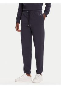 GANT - Gant Spodnie dresowe Shield 4200500 Granatowy Regular Fit. Kolor: niebieski. Materiał: bawełna #1