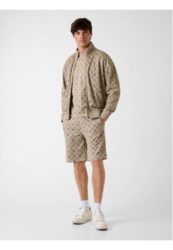 Guess T-Shirt 181498 Beżowy Classic Fit. Kolor: beżowy