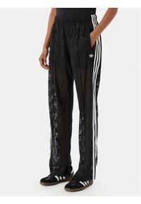 Adidas - adidas Spodnie dzianinowe Crochet Firebird KD0346 Czarny Regular Fit. Kolor: czarny. Materiał: syntetyk #1