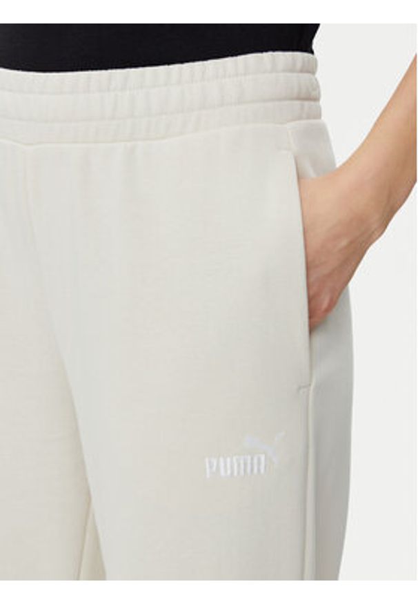 Puma Spodnie dresowe Ess Small No. 1 Logo 684979 Beżowy Straight Fit. Kolor: beżowy. Materiał: bawełna