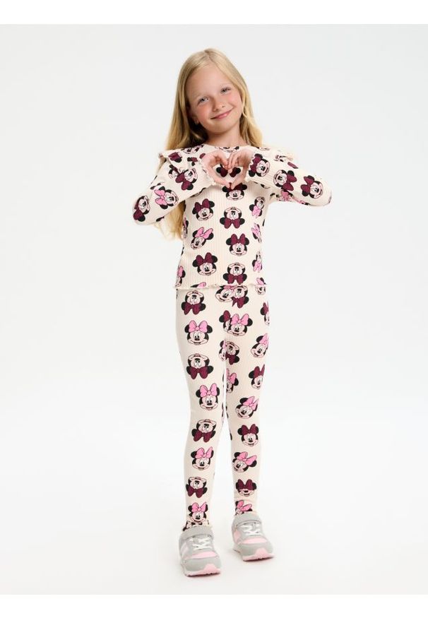 Sinsay - Dzianinowe legginsy w prążek Minnie Mouse - różowy. Kolor: różowy. Materiał: dzianina. Wzór: motyw z bajki, prążki