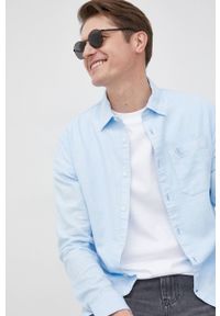 Calvin Klein Jeans koszula z domieszką lnu męska slim z kołnierzykiem klasycznym. Typ kołnierza: kołnierzyk klasyczny. Kolor: niebieski. Materiał: len. Wzór: aplikacja. Styl: klasyczny