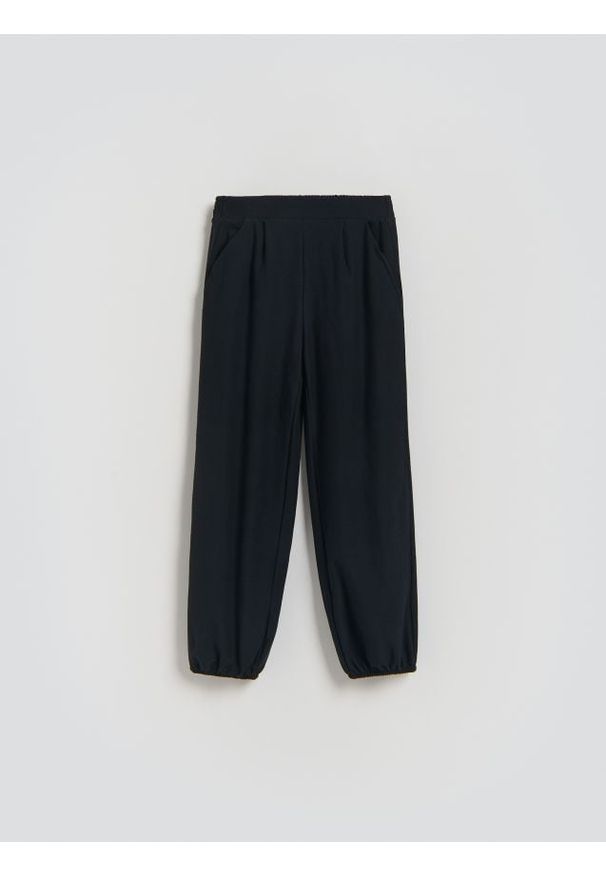 Reserved - Spodnie bombacho - czarny. Kolor: czarny. Materiał: bawełna