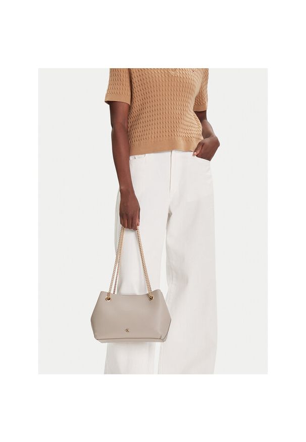 Torebka Calvin Klein. Kolor: beżowy