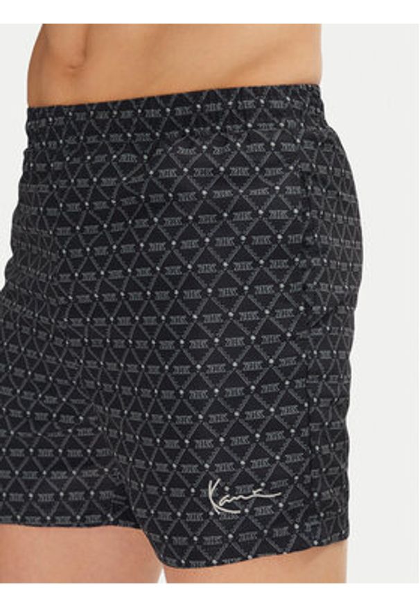 Karl Kani Szorty kąpielowe Signature Monogram Aop 60550022 Czarny Regular Fit. Kolor: czarny. Materiał: syntetyk