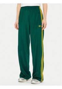 Adidas - adidas Spodnie dresowe adicolor Classic Firebird JP2314 Zielony Loose Fit. Kolor: zielony. Materiał: syntetyk #1