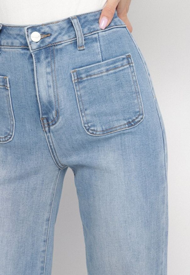 Born2be - Niebieskie Szerokie Jeansy z Bawełną i Wysokim Stanem Elanilena. Okazja: na co dzień. Stan: podwyższony. Kolor: niebieski. Styl: elegancki, casual