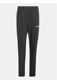 Adidas - adidas Spodnie outdoor Multi Essentials JP0811 Czarny Regular Fit. Kolor: czarny. Materiał: syntetyk. Sport: outdoor #7