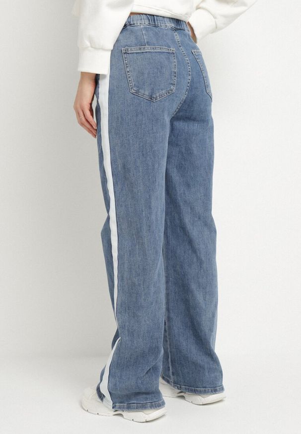 Born2be - Niebieskie Jeansy o Szerokim Kroju z Gumką w Pasie i Lampasami Nusaria. Okazja: na co dzień. Kolor: niebieski. Styl: casual, elegancki