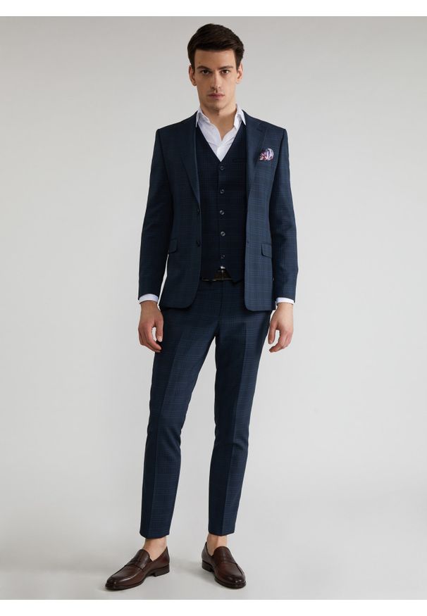 Pako Lorente - Granatowe spodnie garniturowe w subtelną kratę P22SF-6G-024-G-S. Kolor: niebieski. Materiał: poliester, elastan, wiskoza