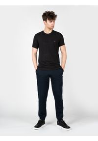 Emporio Armani T-shirt C-neck | 1108533 F584 | Mężczyzna | Czarny. Okazja: na co dzień. Kolor: czarny. Materiał: poliester, elastan, wiskoza. Styl: klasyczny, casual, elegancki #1