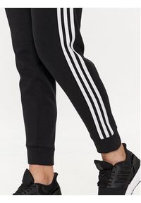 Adidas - adidas Spodnie dresowe Future Icons 3-Stripes IN9479 Czarny Regular Fit. Kolor: czarny. Materiał: syntetyk #3